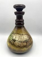 Full front view of ceramic decanter