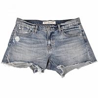 Front view of shorts showing overall appearance, distressing, and frayed hem