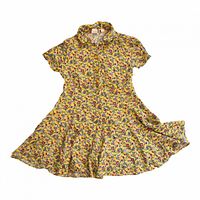 Full view of yellow floral butterfly dress laid flat