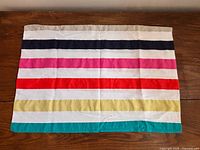 Front view of striped pillow sham laid flat