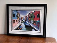 Full view of framed print on wall