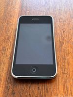 Front view of iPhone 3GS showing screen and home button