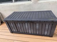 Full view of Keter resin deck box with lid closed