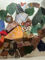 Mixed stone slabs of various colors and shapes