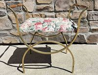 Full view of bench front showing metal frame and floral seat