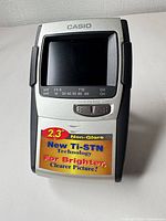 Front view showing screen, Casio logo, Ti-STN sticker and control layout