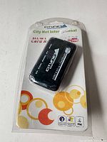 Retail blister pack showing CityNet YH-103-BK black card reader and included USB cable