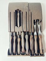 Front view of Cutco twin block with inserted knives and forks