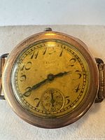 Front view of Elgin wristwatch dial and case