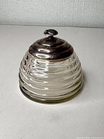 Full honey pot assembled showing beehive shape and lid