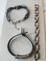 Overview of three bracelets on display