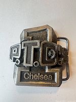 Front view showing raised design and Chelsea text