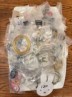 Tray containing individually bagged jewelry pieces