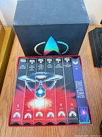 Open Star Trek VHS box showing six tapes inside slipcase