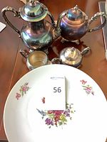 Overall view of tea set and porcelain plate