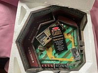 Game in original foam packaging showing full board and accessories