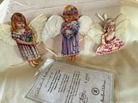 Three Bradford Editions Heaven’s Little Angels ornaments with Certificate of Authenticity