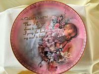 Front view of Bradford Exchange "A Child's Prayer" plate showing design and inscription