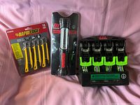 All three packaged tool items laid out