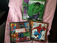 All three Marvel framed prints displayed