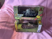 Both boxed tanks stacked: Panzer IV Ausf. D upper, Hetzer lower