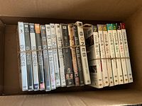 DVD box sets for Bones seasons 1-12 and Rizzoli & Isles seasons 1-7 arranged in cardboard box