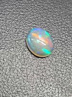 Front view of the opal showing multicolour play-of-colour