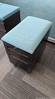 Cabinet with cushion top closed