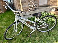Full side view of bicycle on lawn