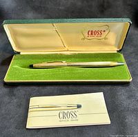 Pen in open Cross case with booklet displayed