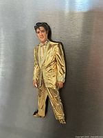 Front view of wood magnet on metal surface showing Elvis image