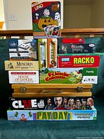 Front view of stacked game boxes showing titles