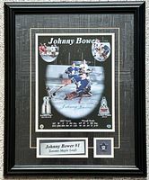 Front view of framed signed Johnny Bower photo display