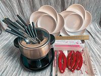 overall lot showing fondue set, plates, chopsticks, sushi mat and lobster items