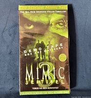 Front view of sealed Mimic 3: Sentinel screener VHS showing title and promo text