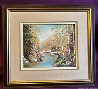 Framed painting showing full view with mat and wood frame