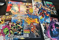 Group shot of all ten comics spread out