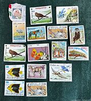 Group of assorted international wildlife-themed postage stamps