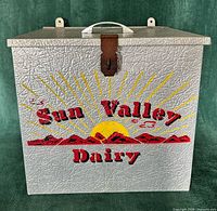 Front view showing Sun Valley Dairy graphic, latch and textured finish