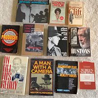 All 11 books laid out front covers visible