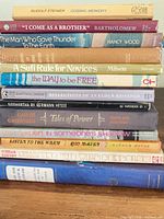 Full stack of books showing spines and titles