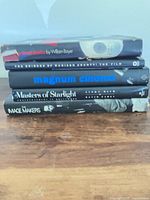 Spine view of five stacked hardcover film books