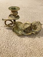 Ornate brass chamber candlestick top view