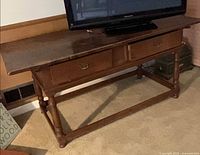 Overall view of table with drawers, legs, stretchers and top