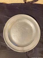 Front view of pewter plate