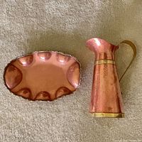 Top view of copper tray and pitcher showing overall design and finish