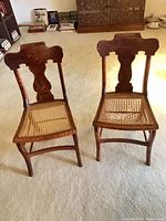 Both chairs side by side showing overall appearance and cane condition