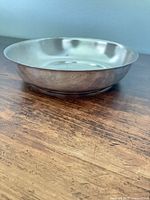 Top angled view of stainless steel bowl showing interior and shape