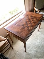 Table with inlaid chessboard surface