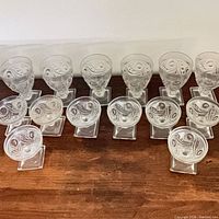 Full set of 14 clear glass pieces showing swirl pattern and square bases
